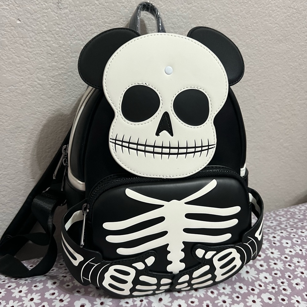 Loungefly Mickey Mouse Skeleton Glow-in-the-Dark Mini Backpack.